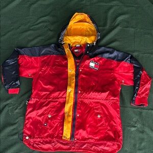 Tommy Hilfiger jacket 🧥 vintage  Raincoat converts to back pack XL
